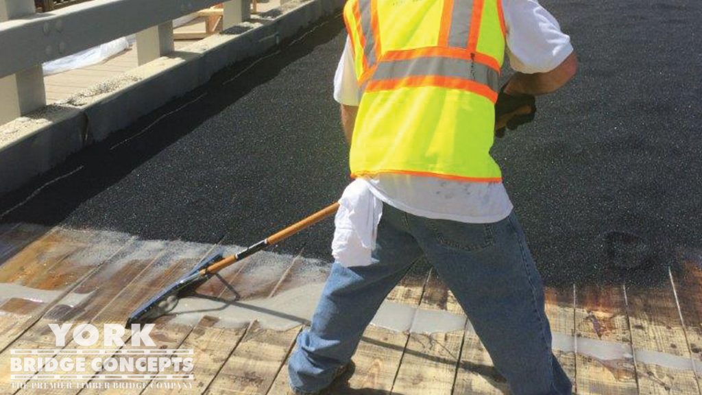 Maintenance & Preservation of Wood Bridges sealing the deck for epoxy aggregate