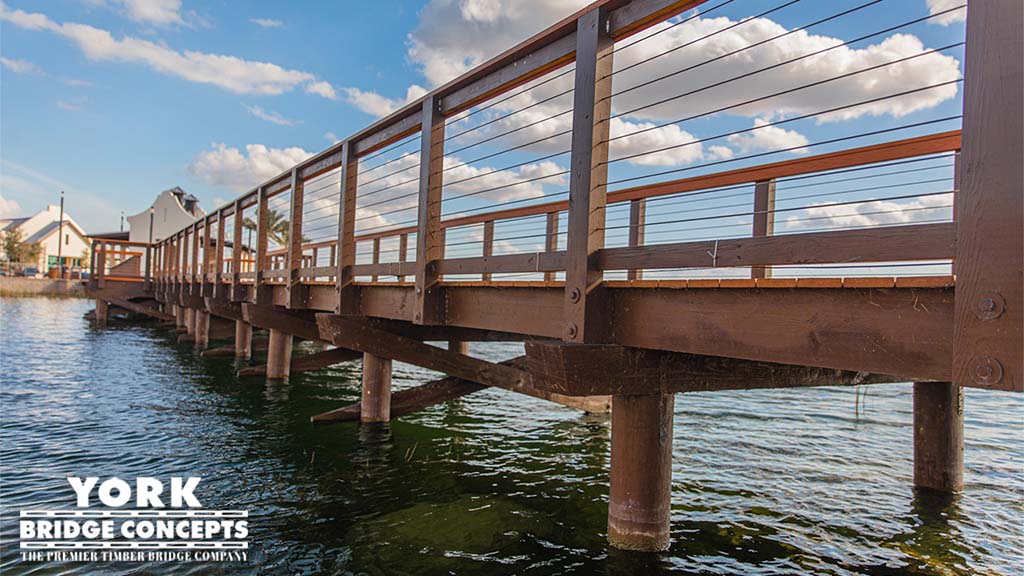 Underside Long View Waterside Place Pedestrian timber Bridge Sarasota, FL