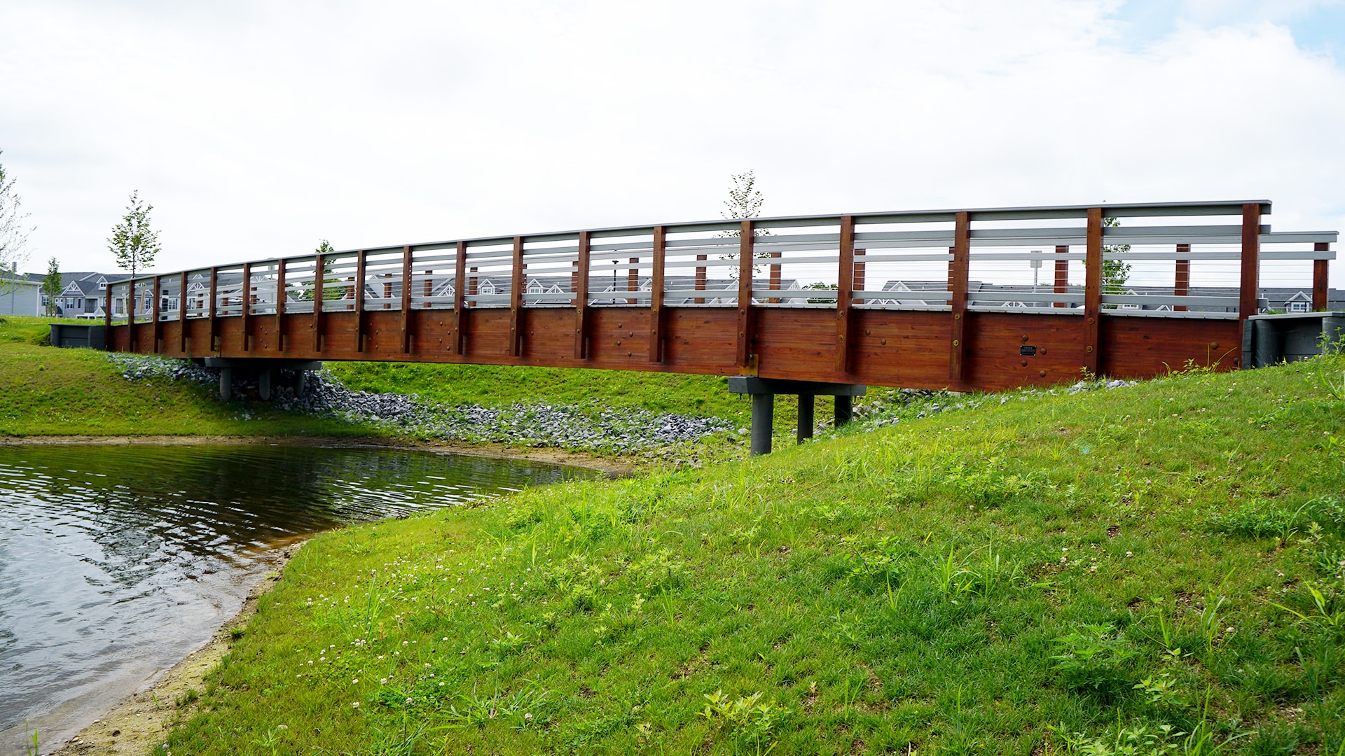 Shoreline profile image for the Heatherwood Spy Glass Golf & Villas Pedestrian Timber Bridge by York Bridge Concepts in Setauket, NY