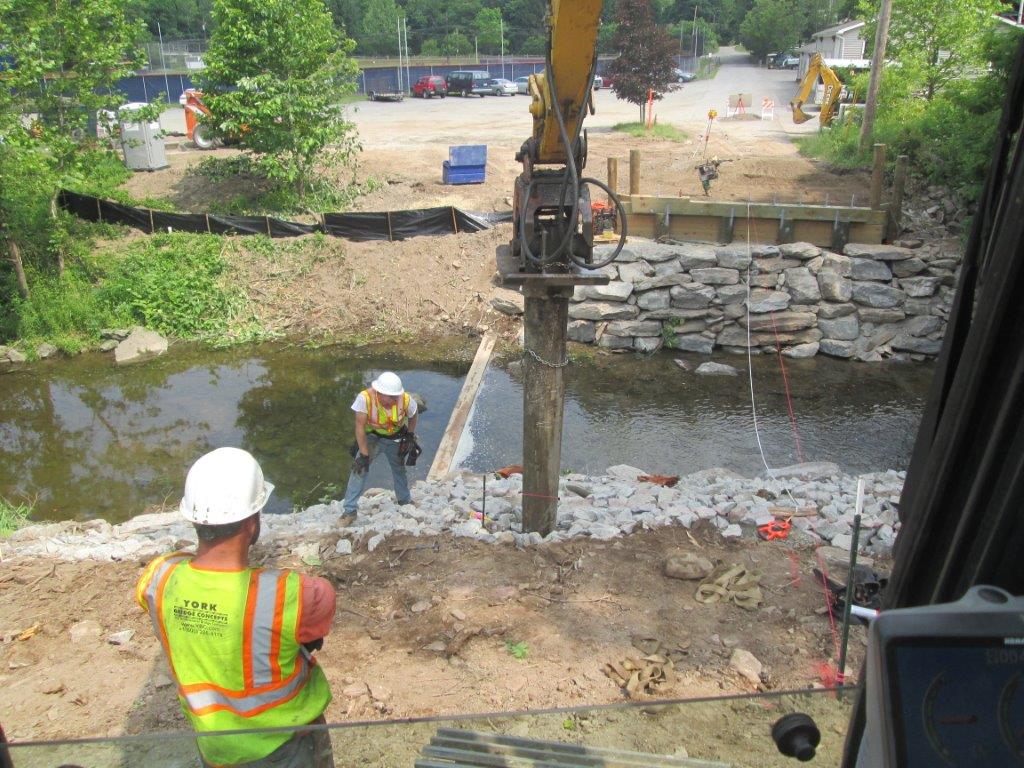 Compliance for Keystone College free-span timber vehicular bridge.