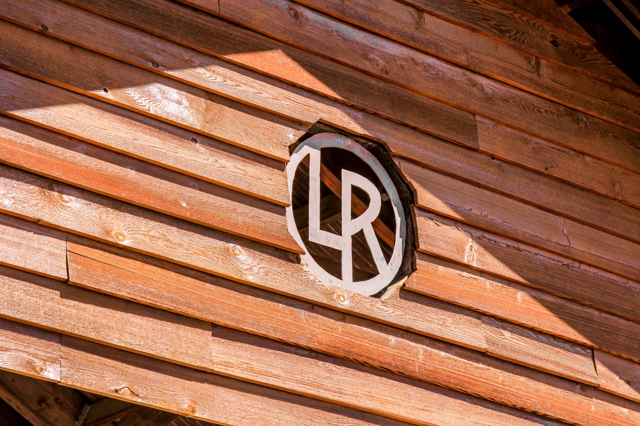 Laughlin Ranch brand insignia on the covered section of the vehicular bridge entrance