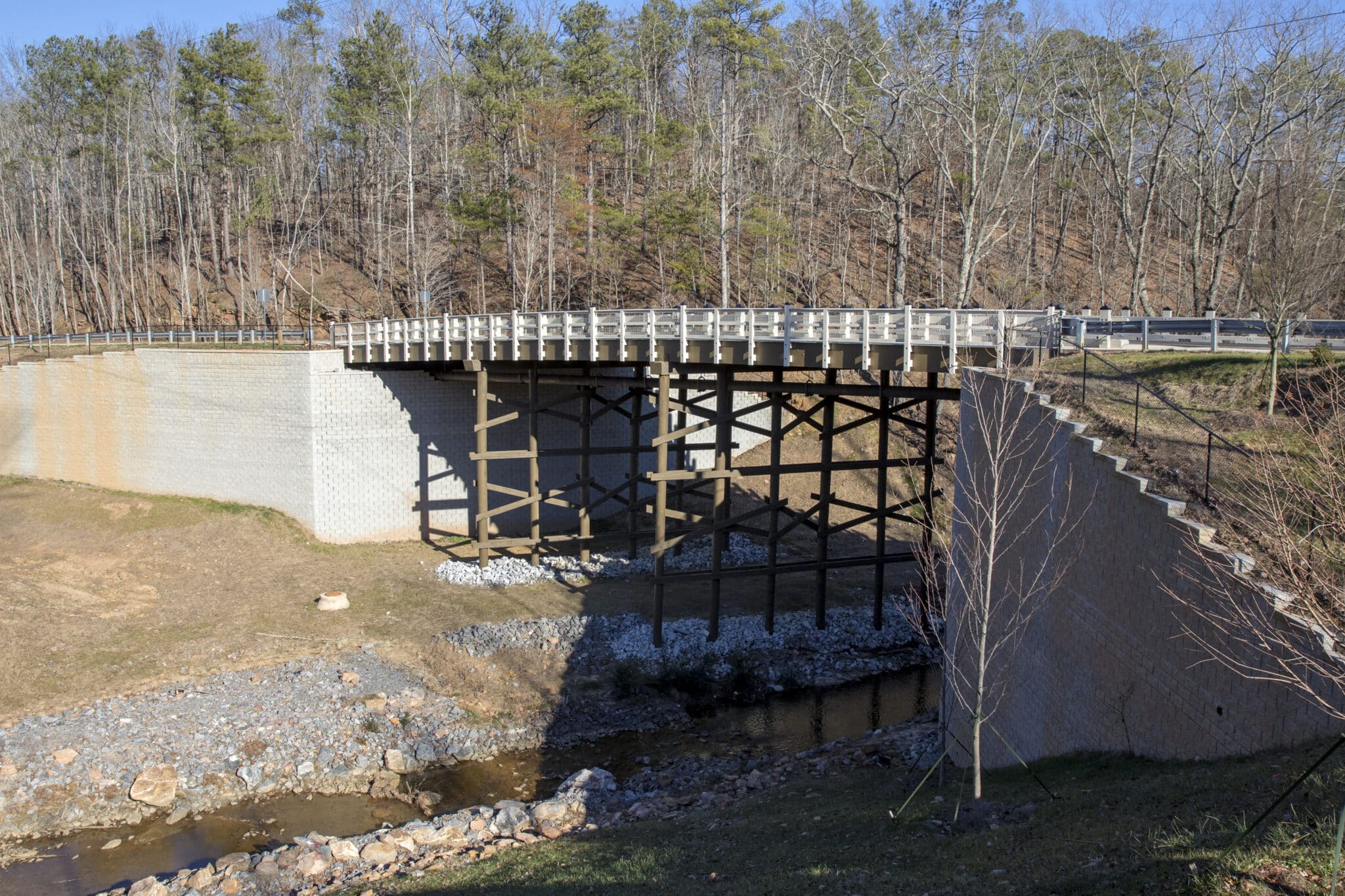 Inspired Living Timber Bridge in Alpharetta, Georgia Design-Built by York Bridge Concepts.