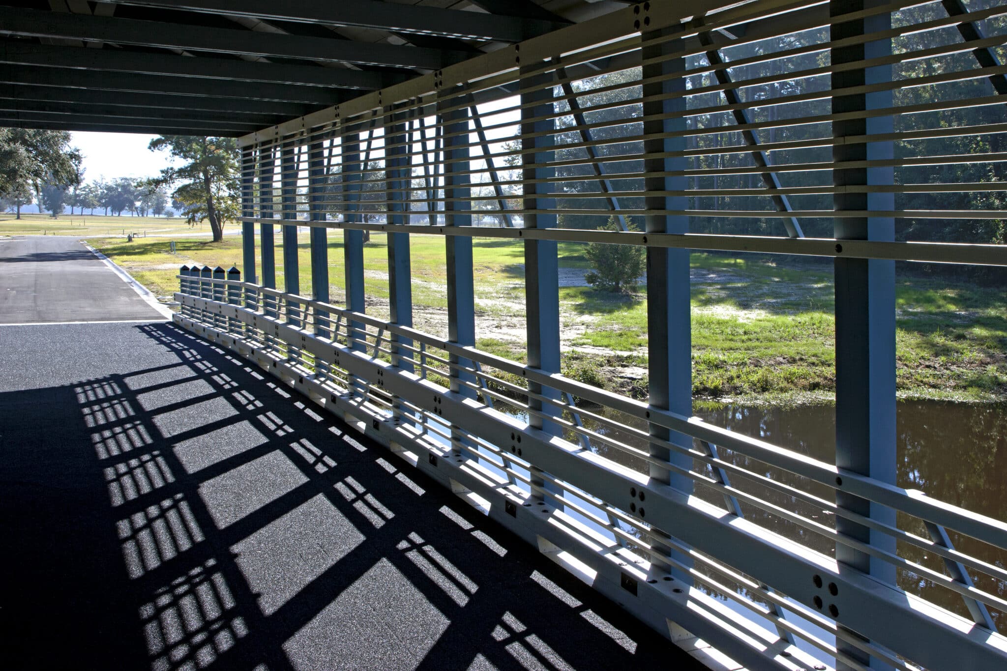 Elevated pickets for vehicular covered timber bridge at The Plantation At Winyah Bay in Georgetown, SC