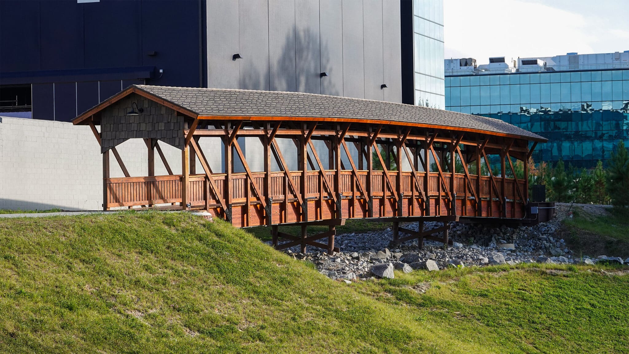 Close up profile of the Assembly Studio covered timber pedestrian bridge.