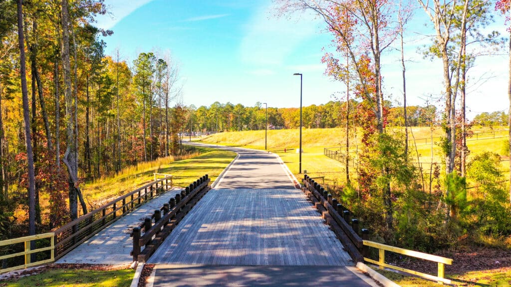 Entryway for the vehicular timber bridge for Pleasant Park built by YBC in Apex, NC