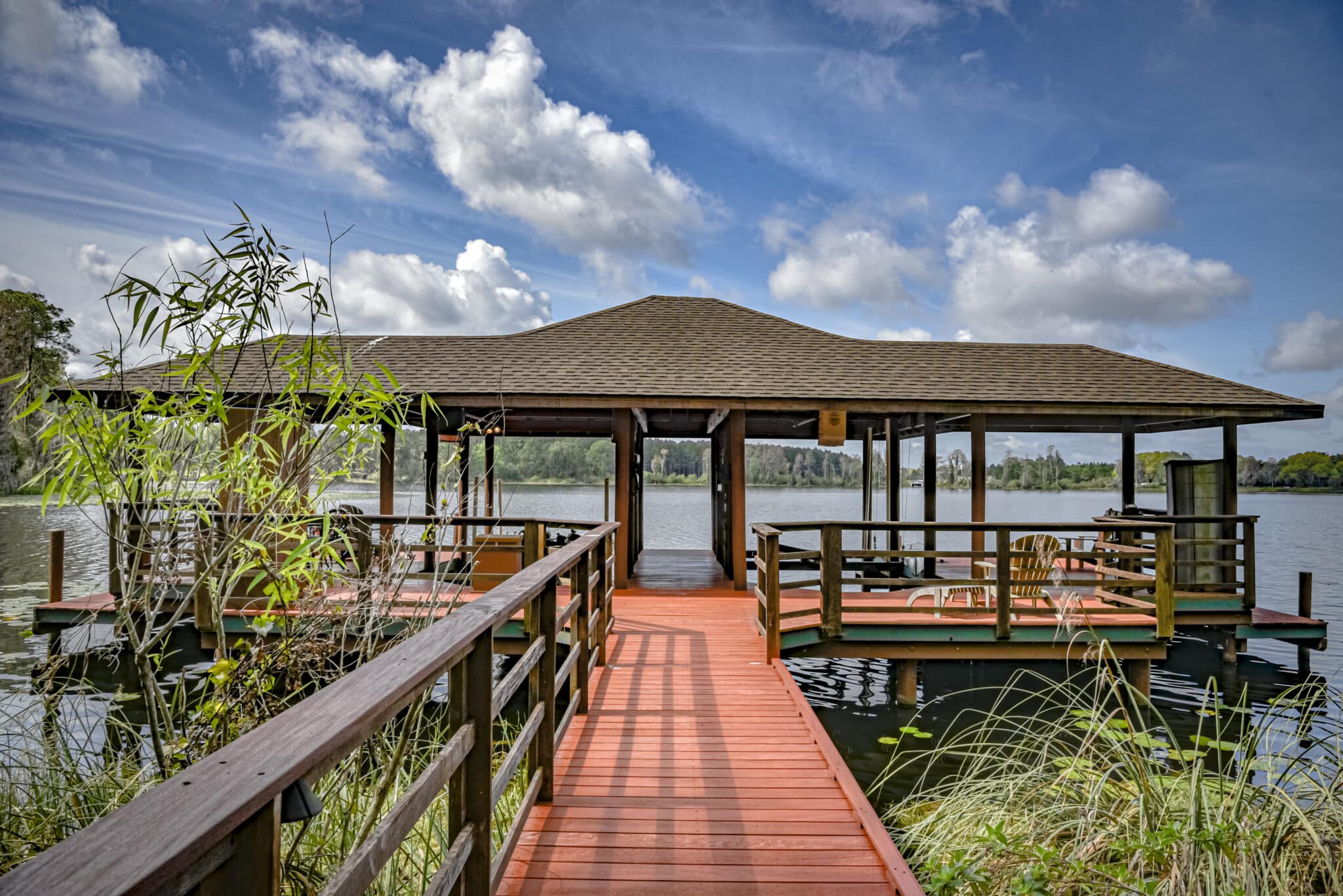 Lakes Edge boardwalk to boat house for private residence in Odessa, FL